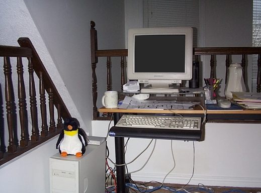 Kim's desk with mascot and coffee urn
